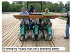 Planting the Rutgers plugs with a Strawberry Planter